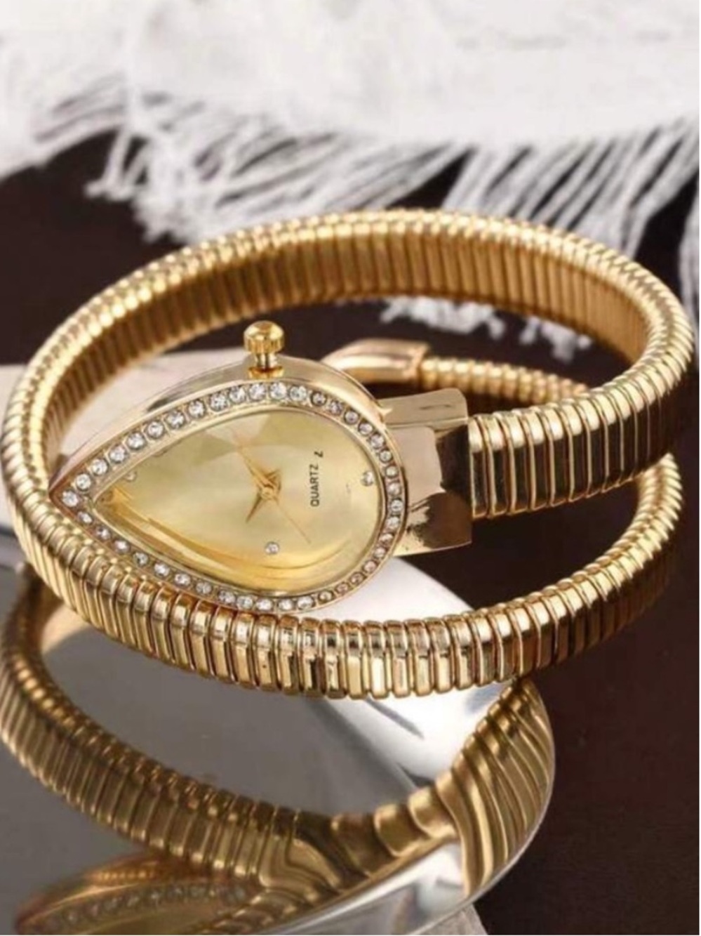 Luxe Sculptural Gold Coil Watch
